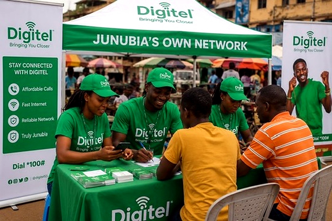 Digitel field team supporting customer onboarding at an activation booth